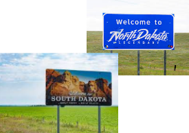 welcome signs for south and north dakota with green filed in the background