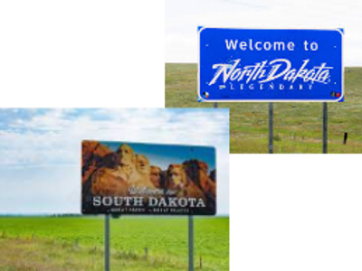 welcome signs for south and north dakota with green filed in the background